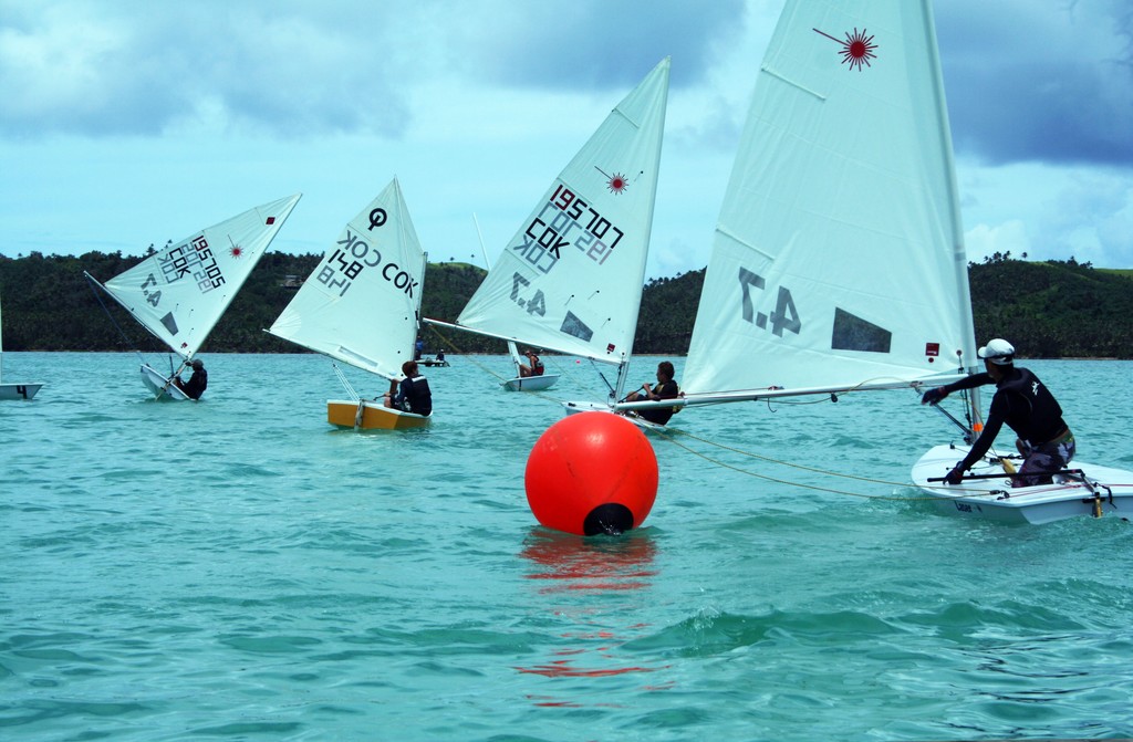 Laser and 4.7 fleets in Aitutaki Lagoon © Anne Tierney